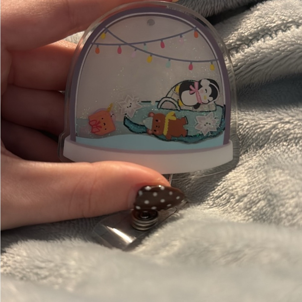 Sky and Oliver Snow Globe Badge Reel